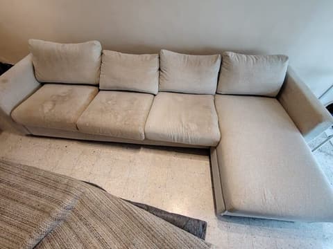 Sofa cleaning in Kepong: fabric L-shaped sofa, before